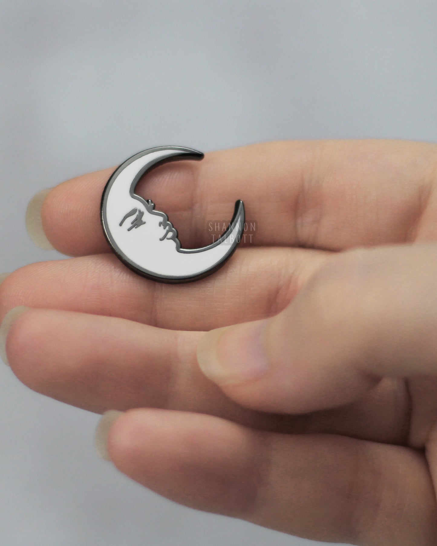 La Luna Crescent Moon Enamel Pin in White with Black Nickel Plating