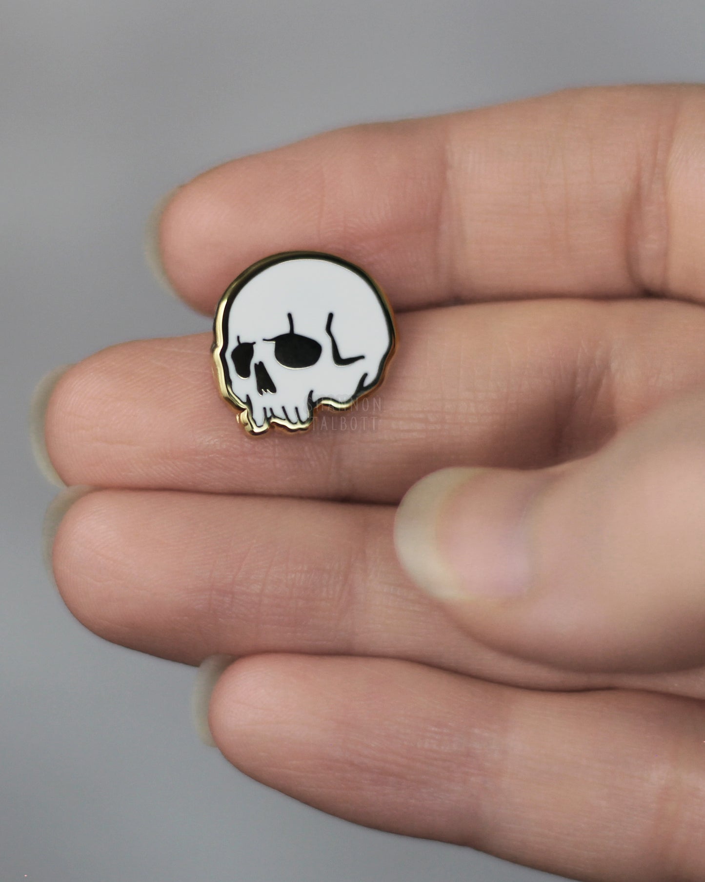 Tiny Skull Mini Goth Enamel Pin in Gold
