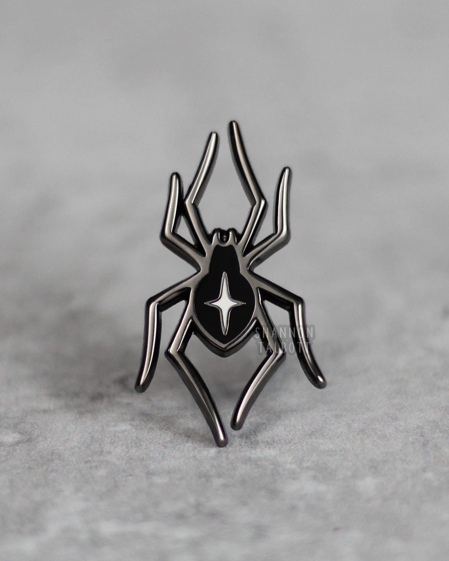 black nickel plated spider enamel pin