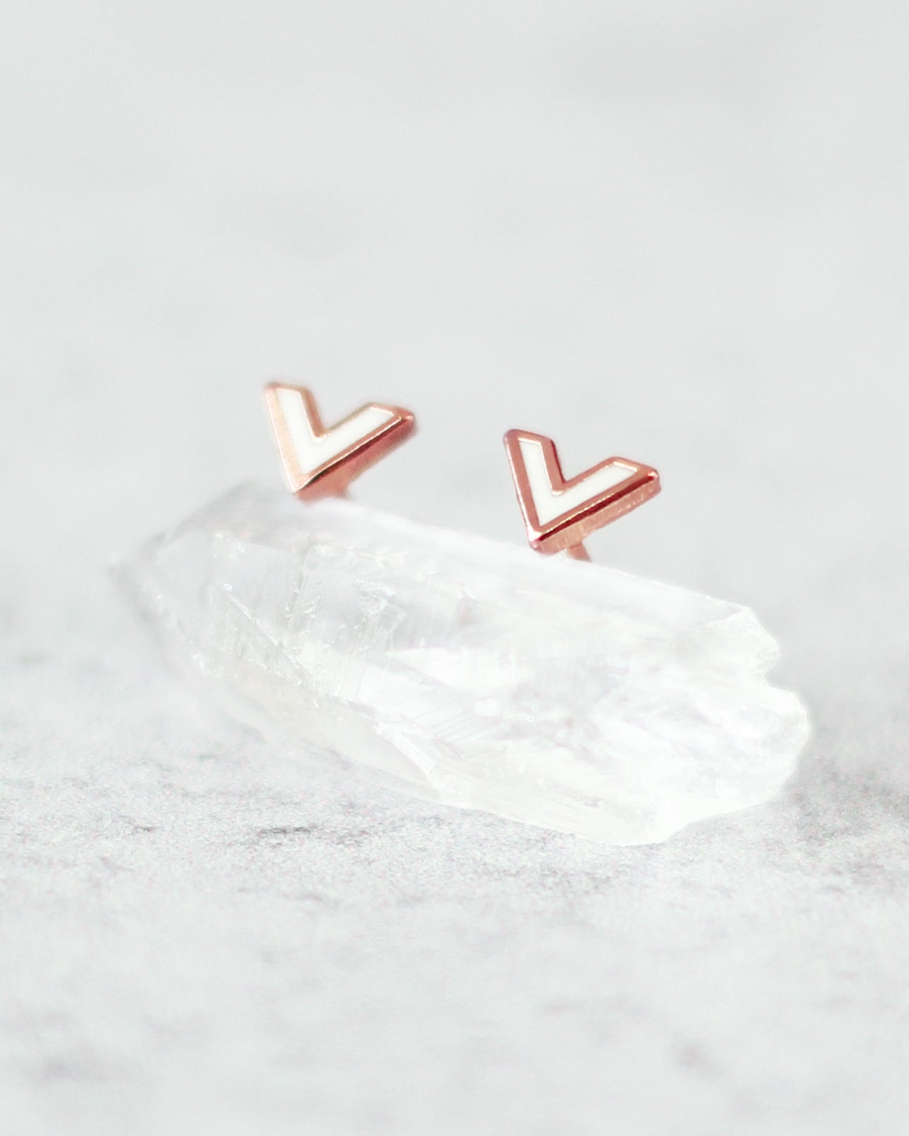 small white chevron enamel earrings with rose gold plating on crystal