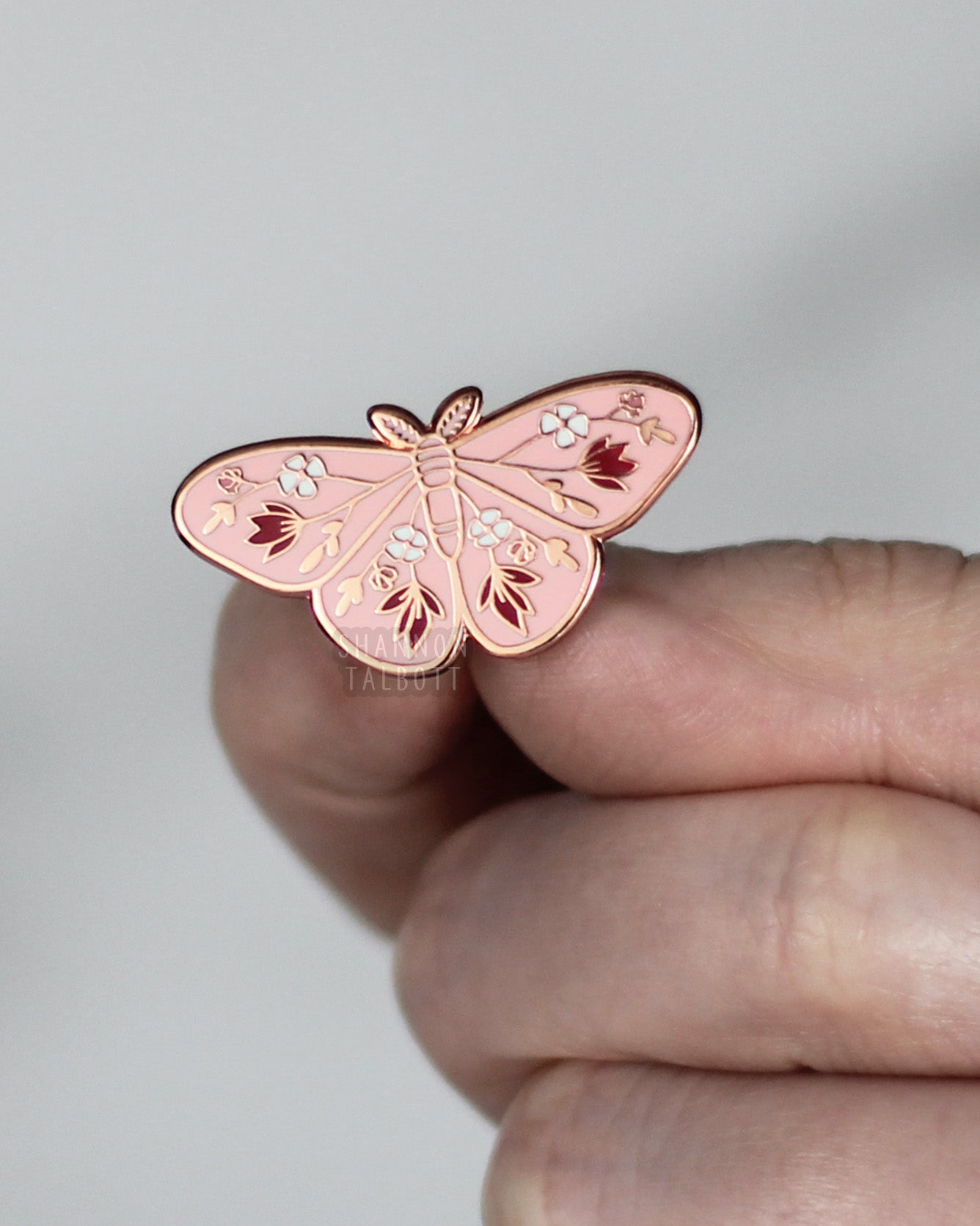 new beginnings moth butterfly enamel pin in pink and rose gold