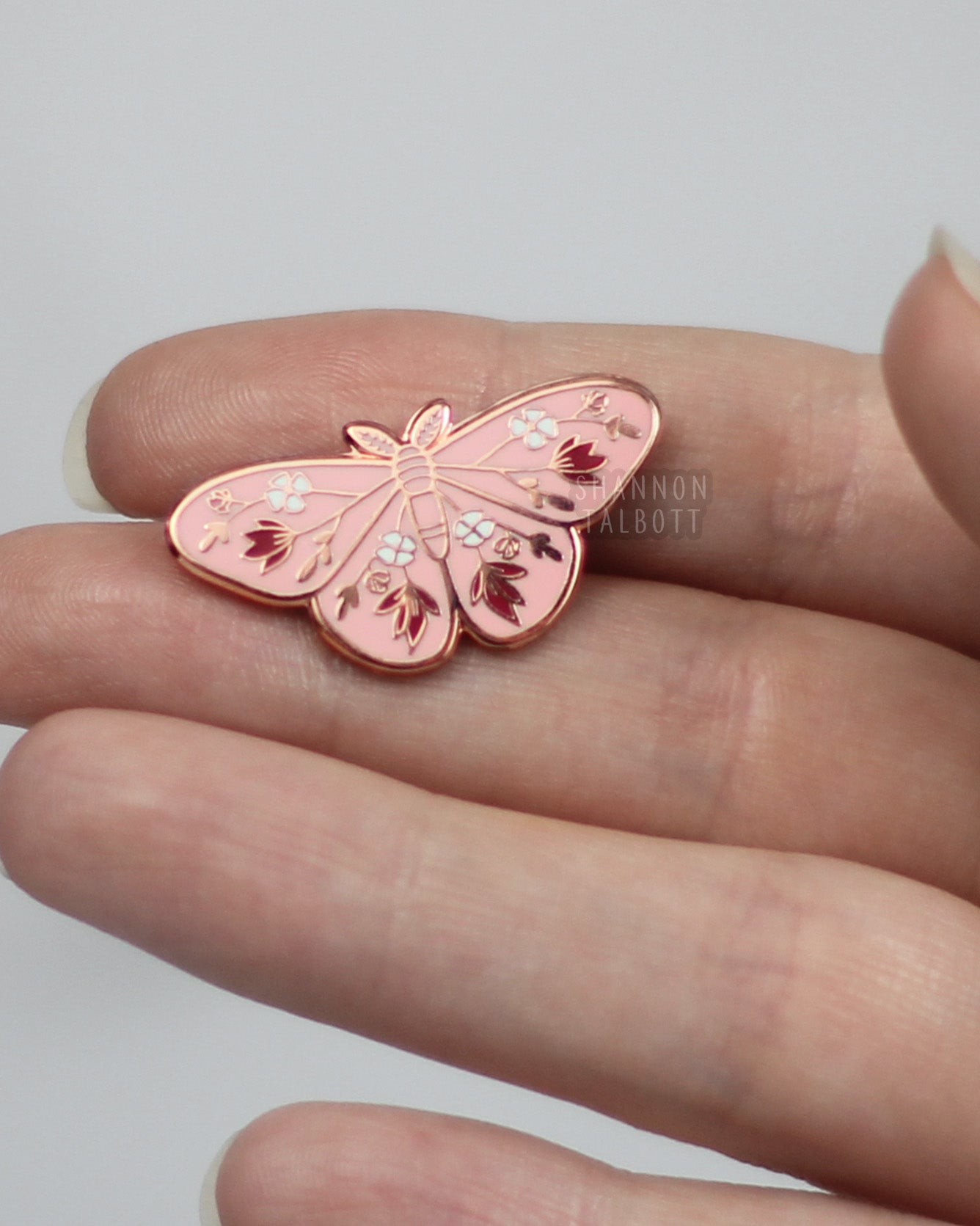 new beginnings moth butterfly enamel pin in pink and rose gold