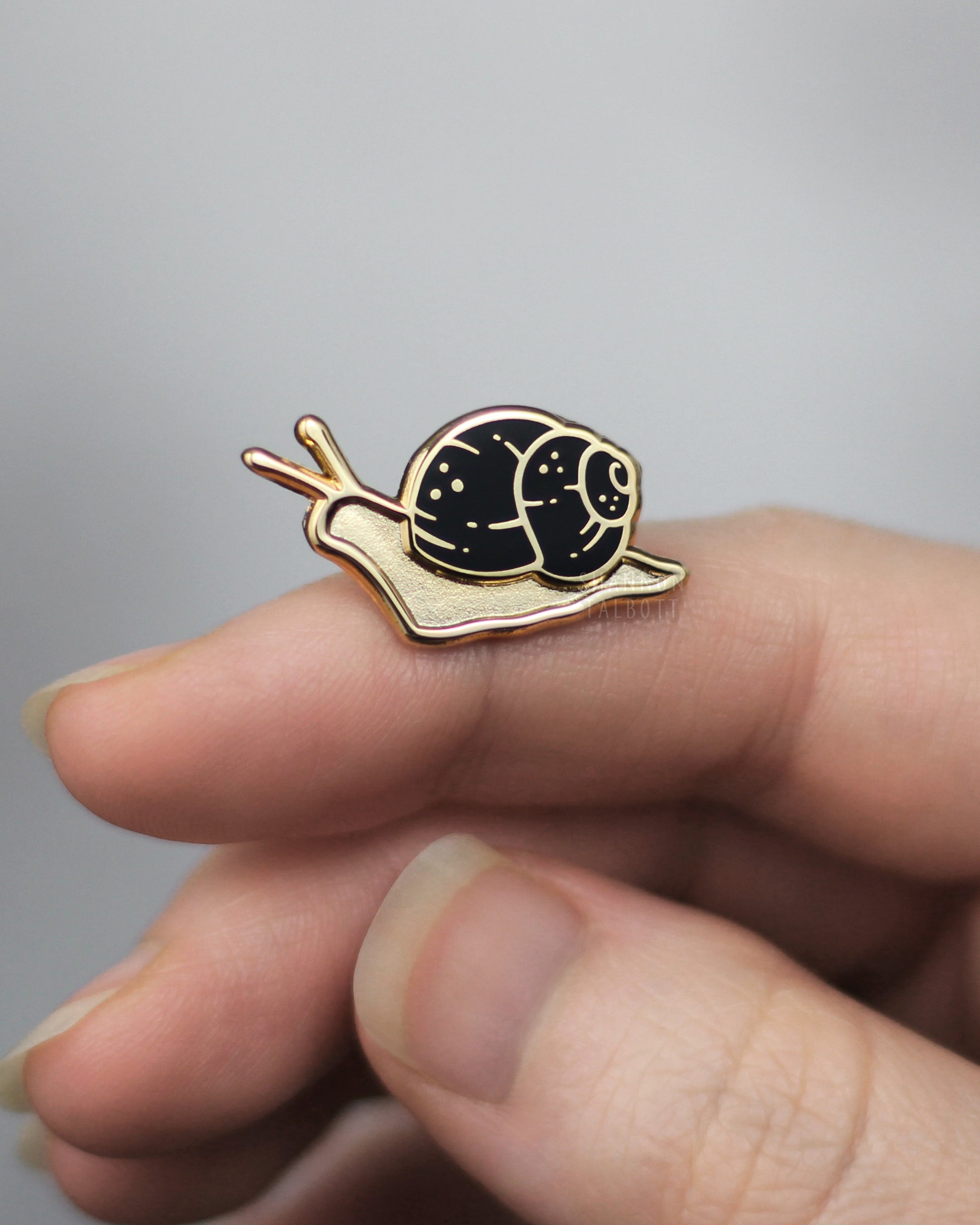 Garden Snail Enamel Pin in Gold Plating