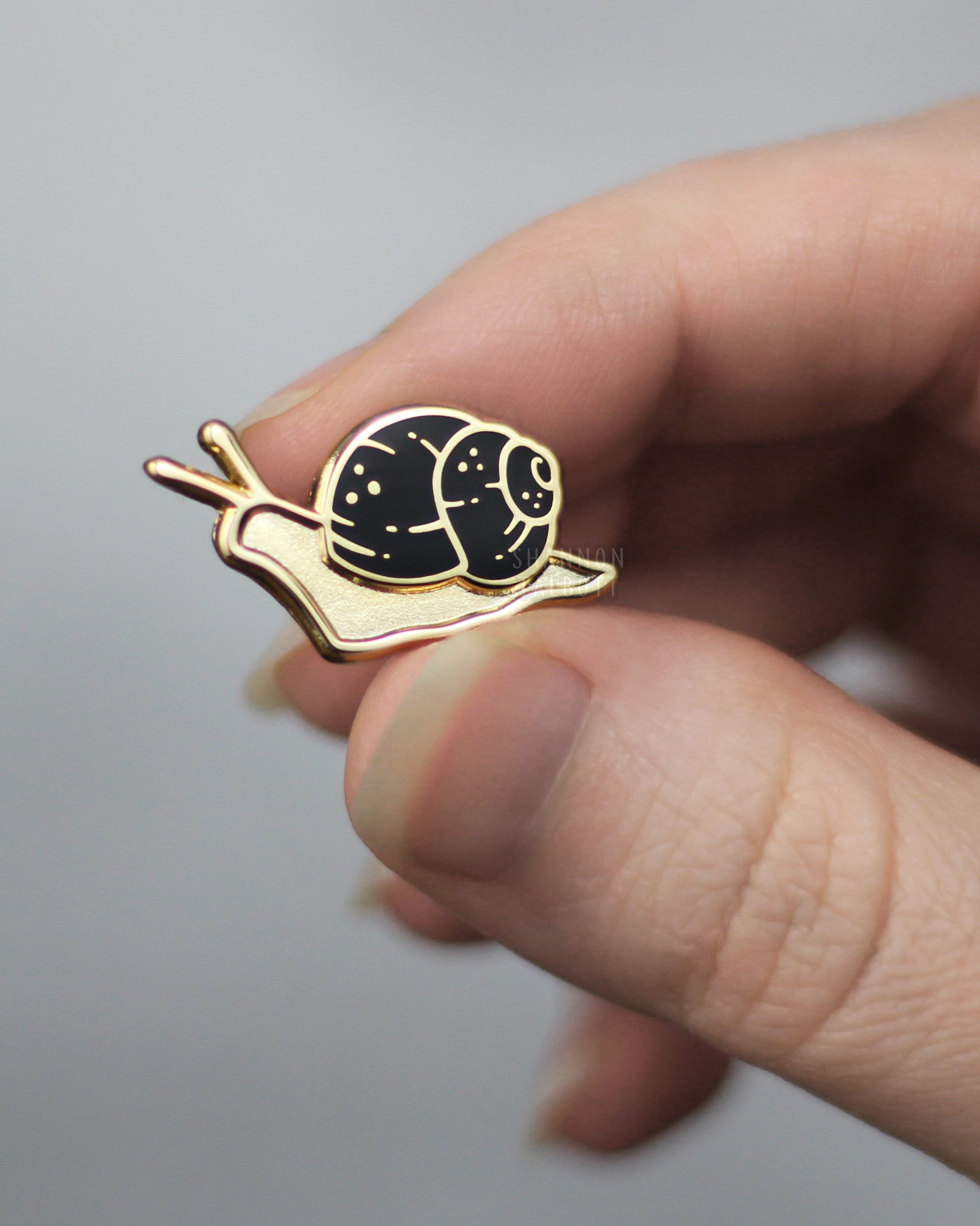 Garden Snail Enamel Pin in Gold Plating