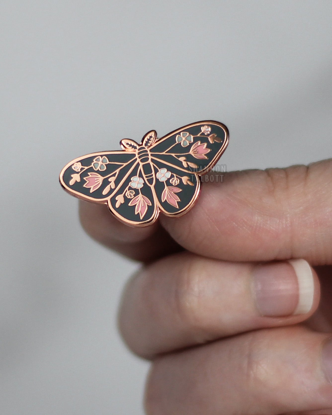 new beginnings moth butterfly enamel pin in blue and rose gold