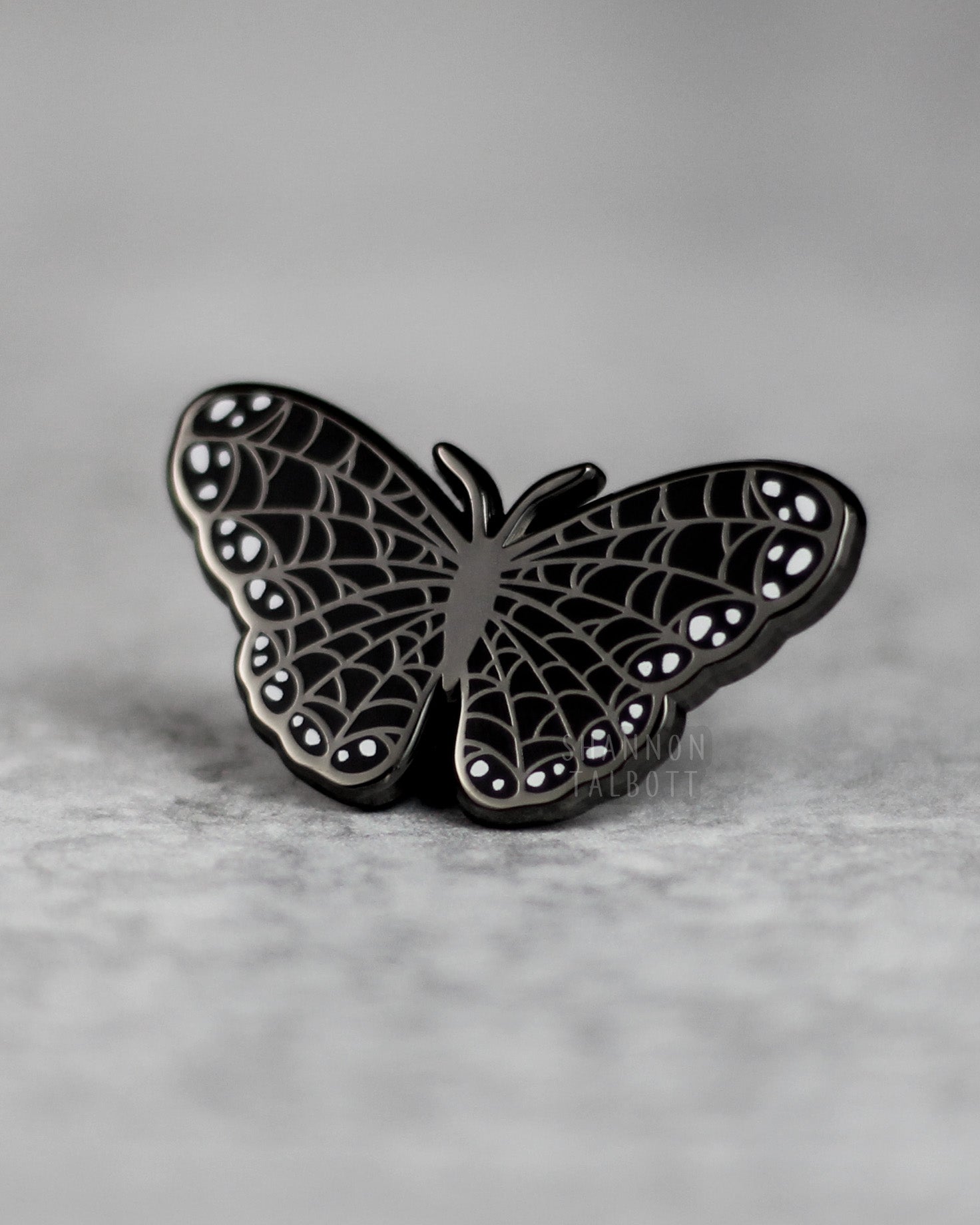 Spooky Spiderweb Butterfly Enamel Pin in Black Nickel