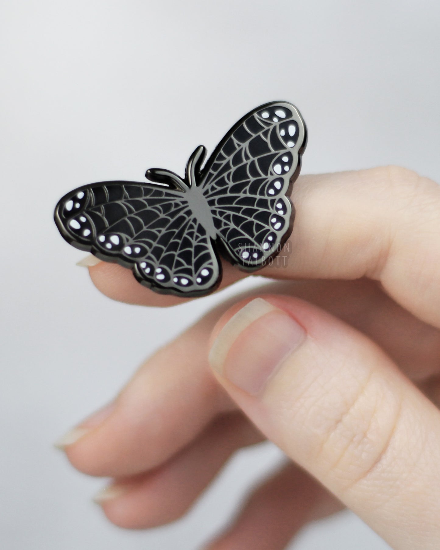 Spooky Spiderweb Butterfly Enamel Pin in Black Nickel