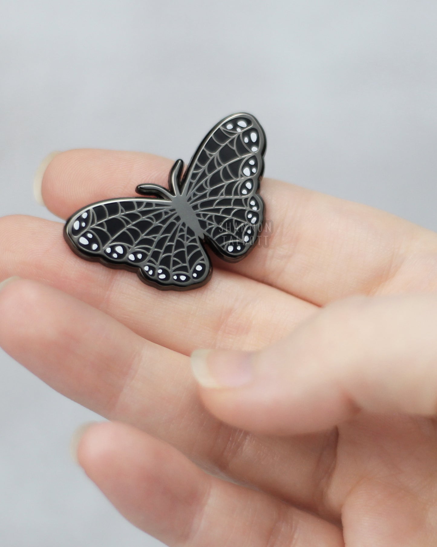 Spooky Spiderweb Butterfly Enamel Pin in Black Nickel